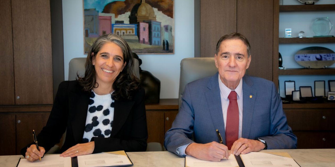 Dr. Jarbas Barbosa and Céline Giustihas, during the signing ceremony