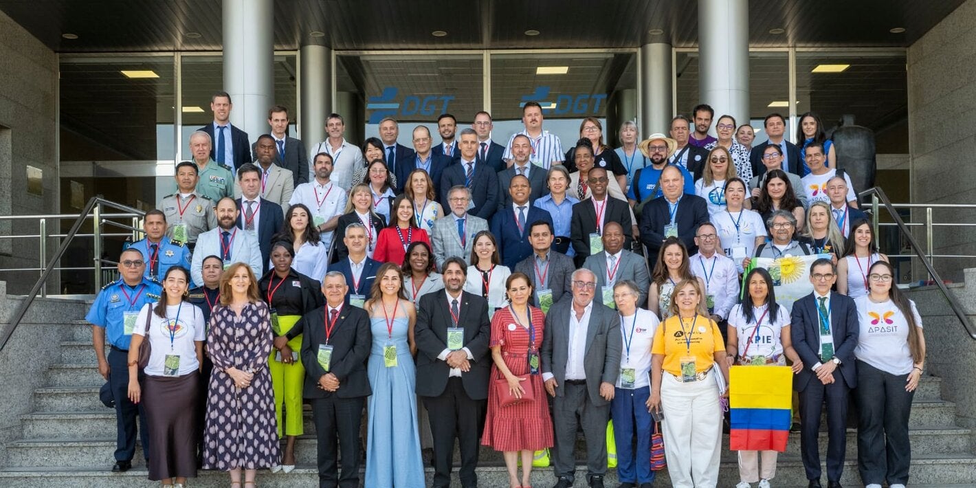 Participants in the OISEVI meeting pose for a group photo on the steps outside the headquarters of Spain’s Directorate-General for Traffic (DGT) in Madrid.