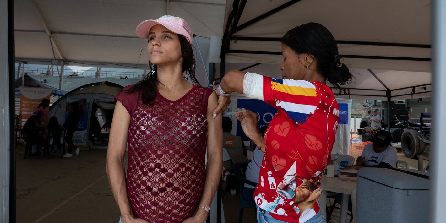 Pregnant woman receives vaccine in Venezuela