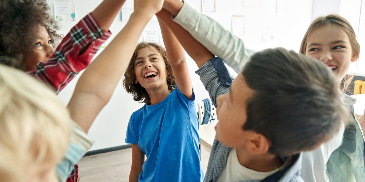 adolescents playing with hands in air