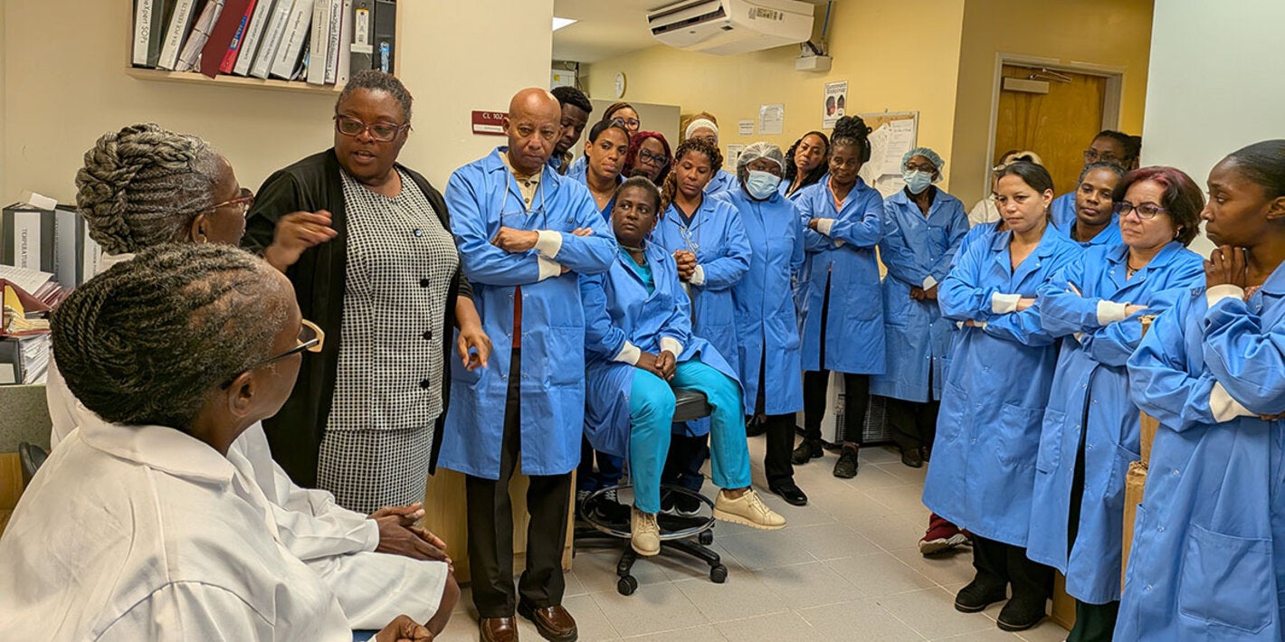 Assessment team with laboratory staff