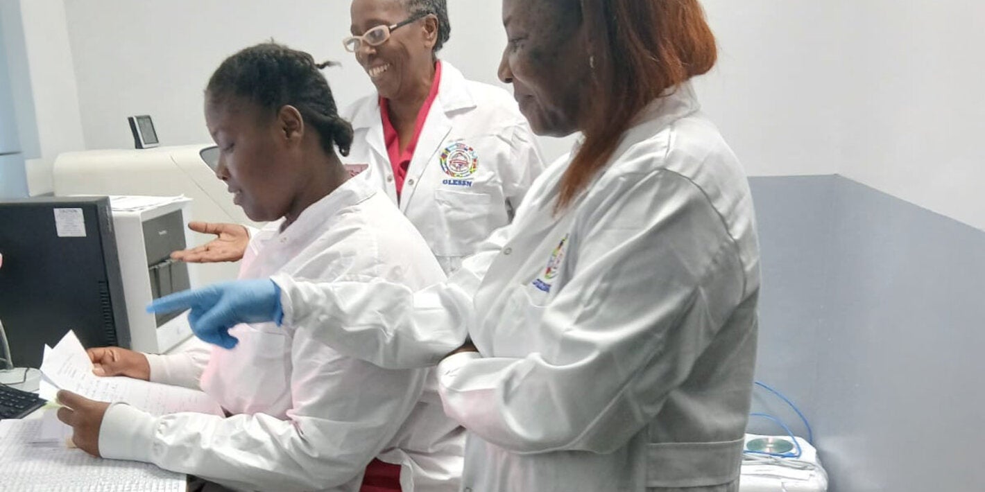 Assessment team in Grenada's laboratory