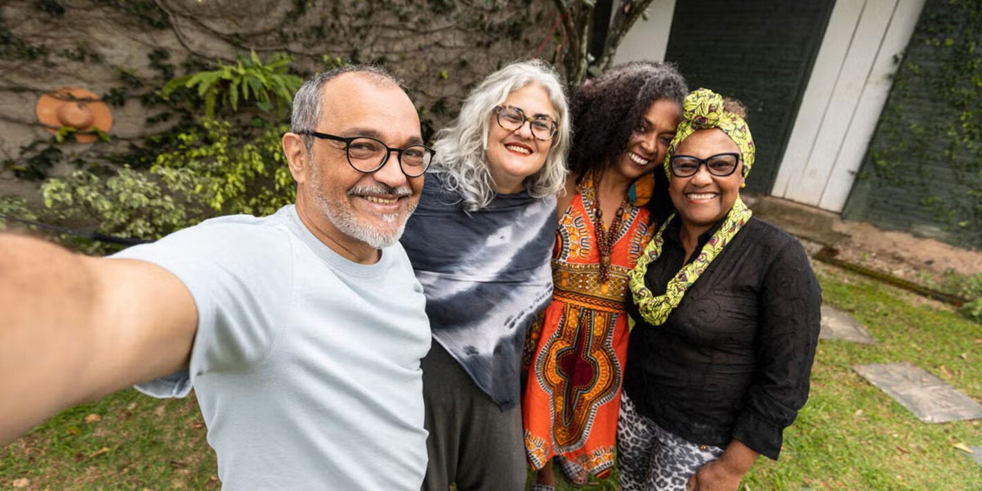 Selfie photo of four grown adults