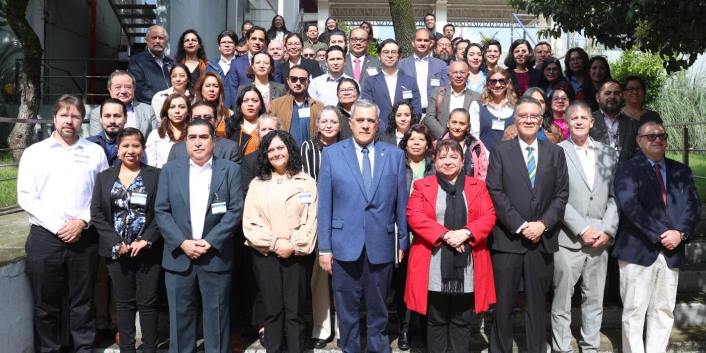 Foto grupal de participantes de la Evaluación Post-Evento 