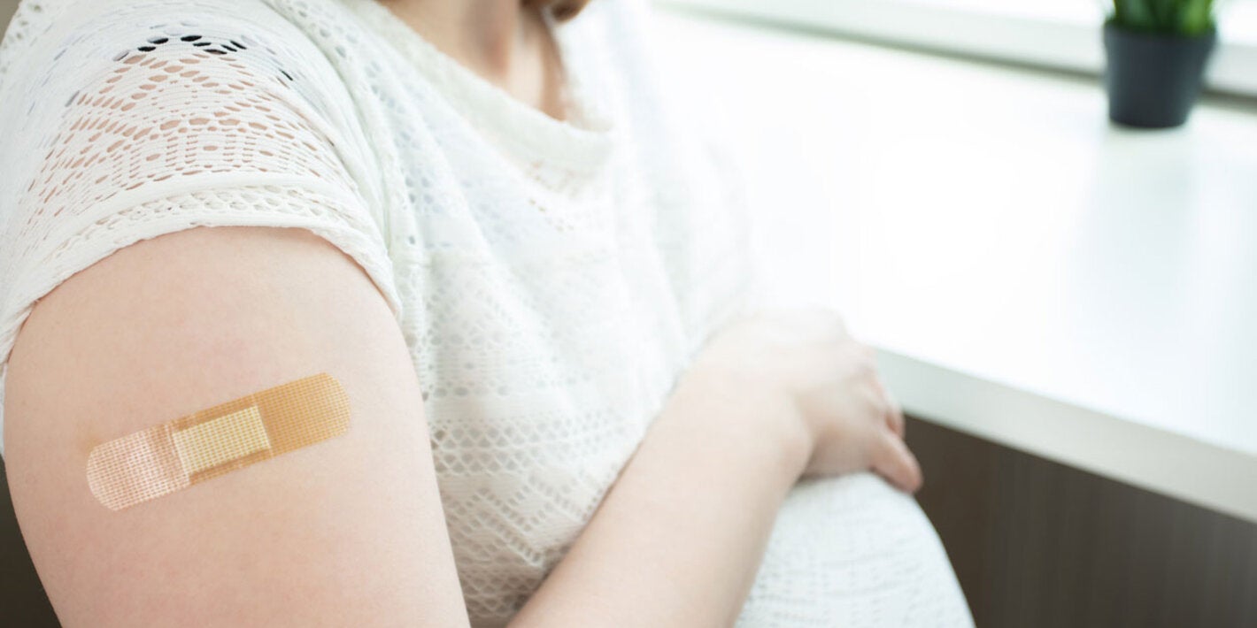 Pregnant woman after being vaccinated