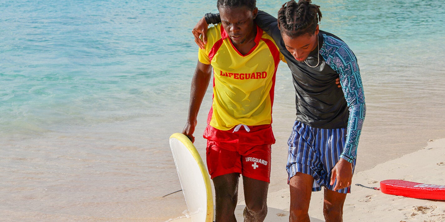 Lifeguard saves person at the beach