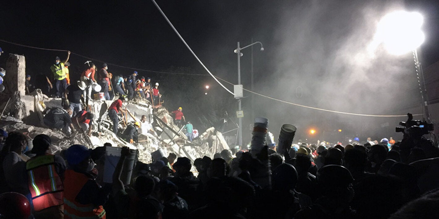 mexico earthquake rescue workers on rubble