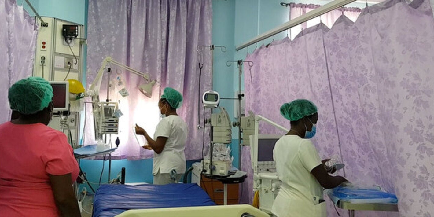 nurses organizing beds in a hospital
