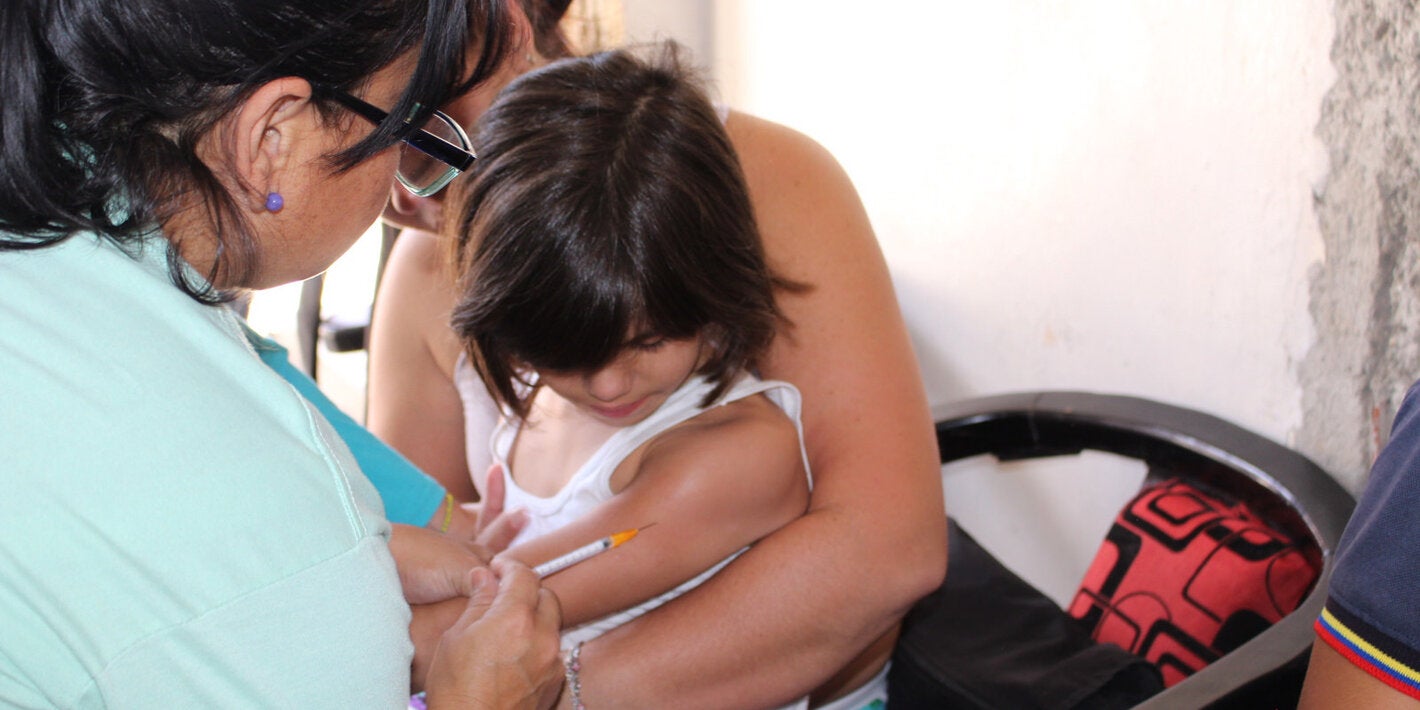 child getting vaccine