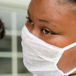 Mother holding toddler