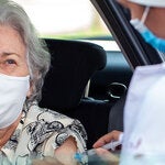 Vaccination of a women and health worker 