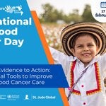 a boy raising his hands