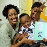 Nurse with mother and child