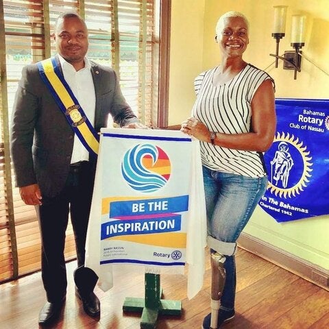 Erin Brown speaks at the Rotary Club of Nassau in 2019.