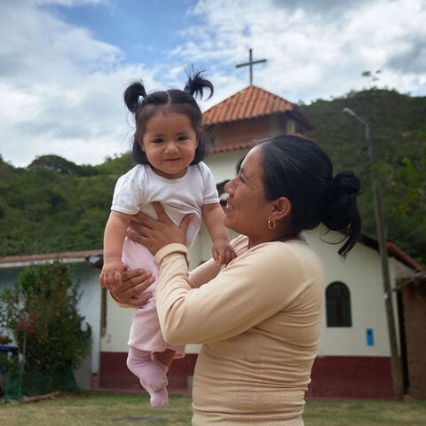 Mother holding child