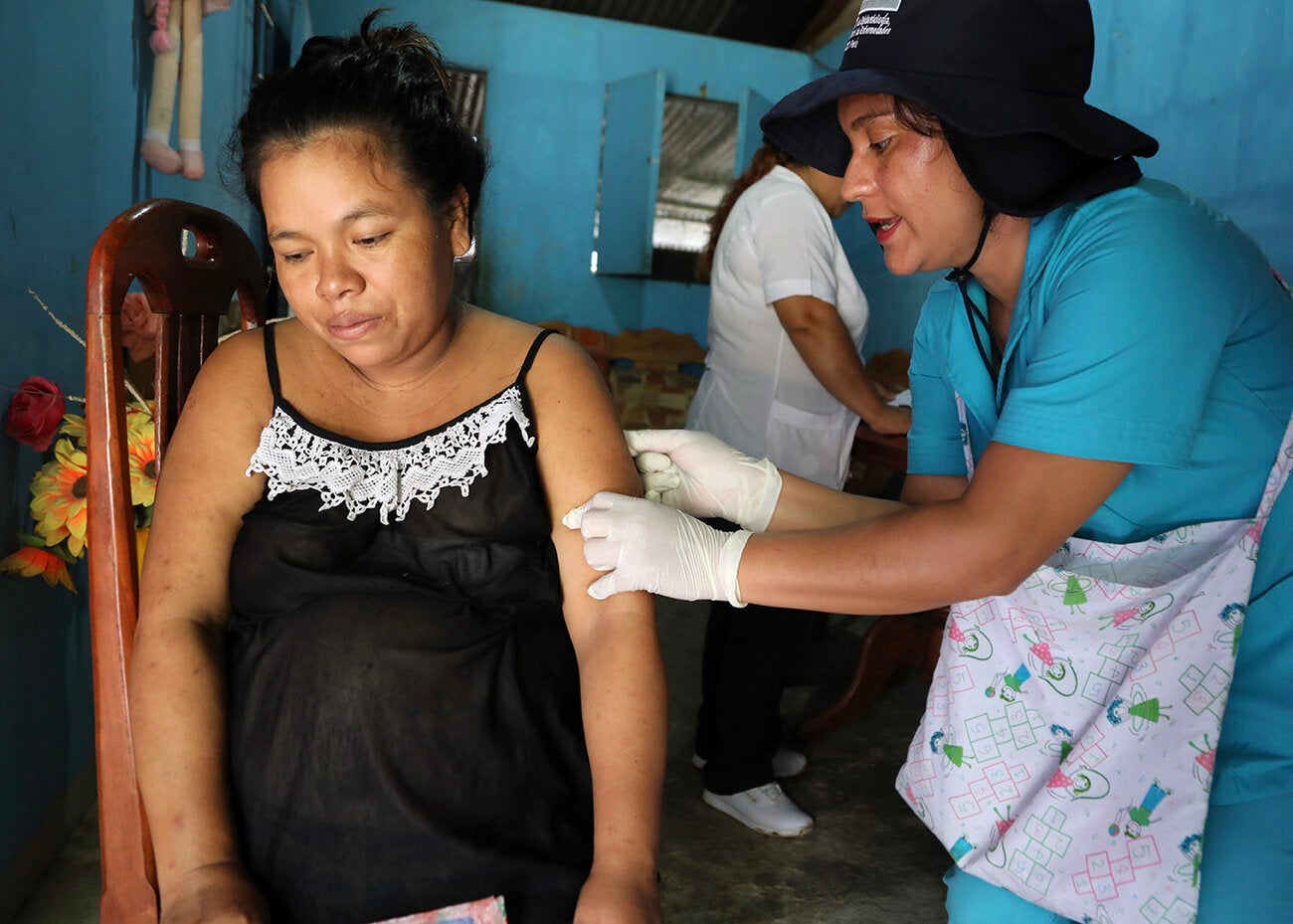 Manuela getting vaccinated