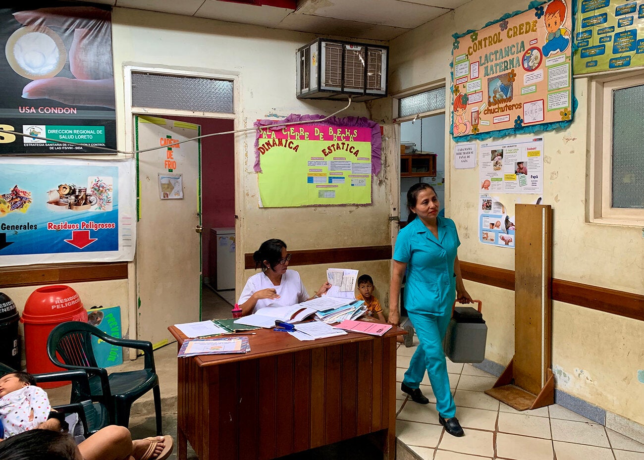 Nurses get ready to leave to vaccinate