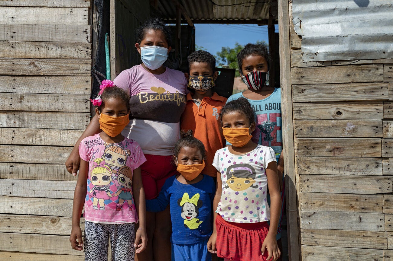 Family under door frame