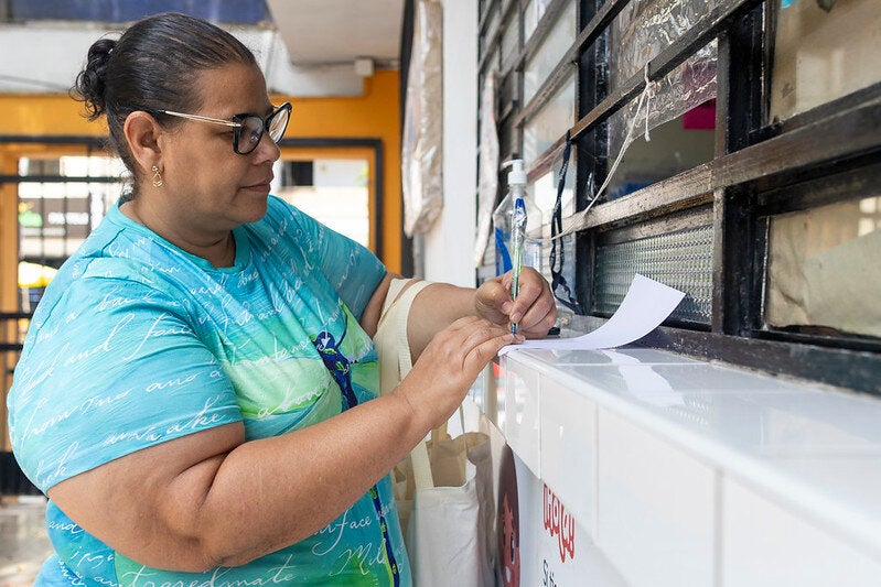 woman filling forms