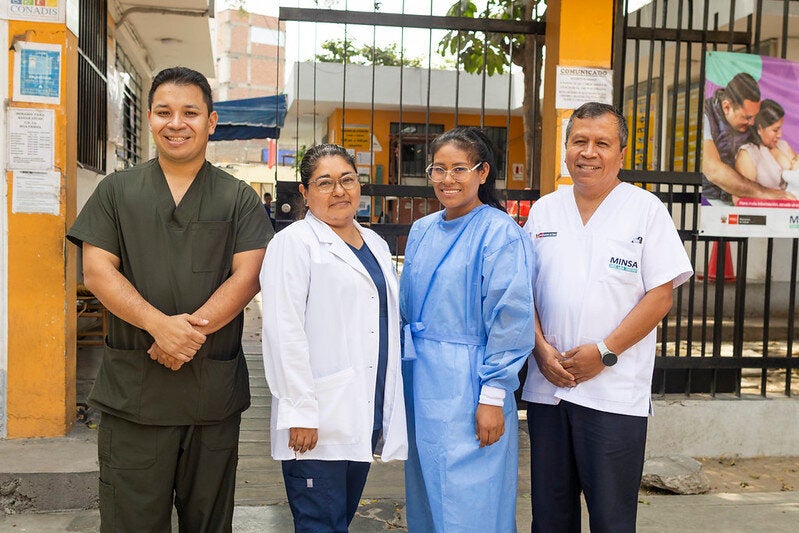 clinic staff outside clinic