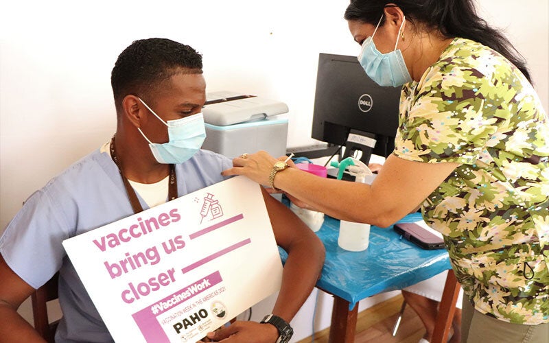 Health worker getting vaccinated