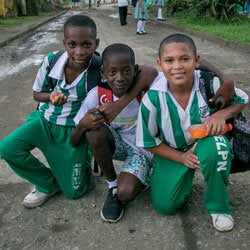 Happy boys playing in the street