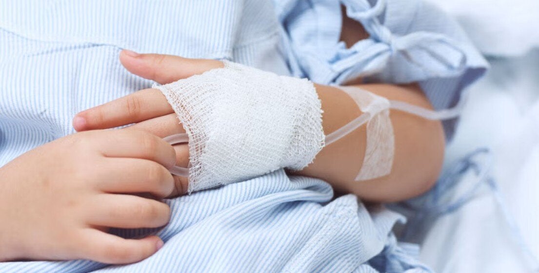 the hands of a patient in a hospital