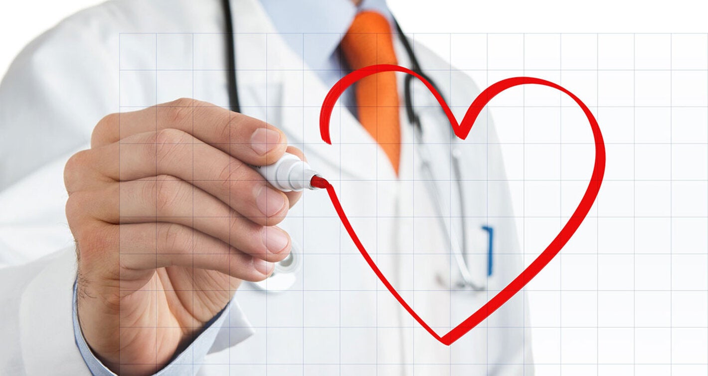 Doctor drawing heart