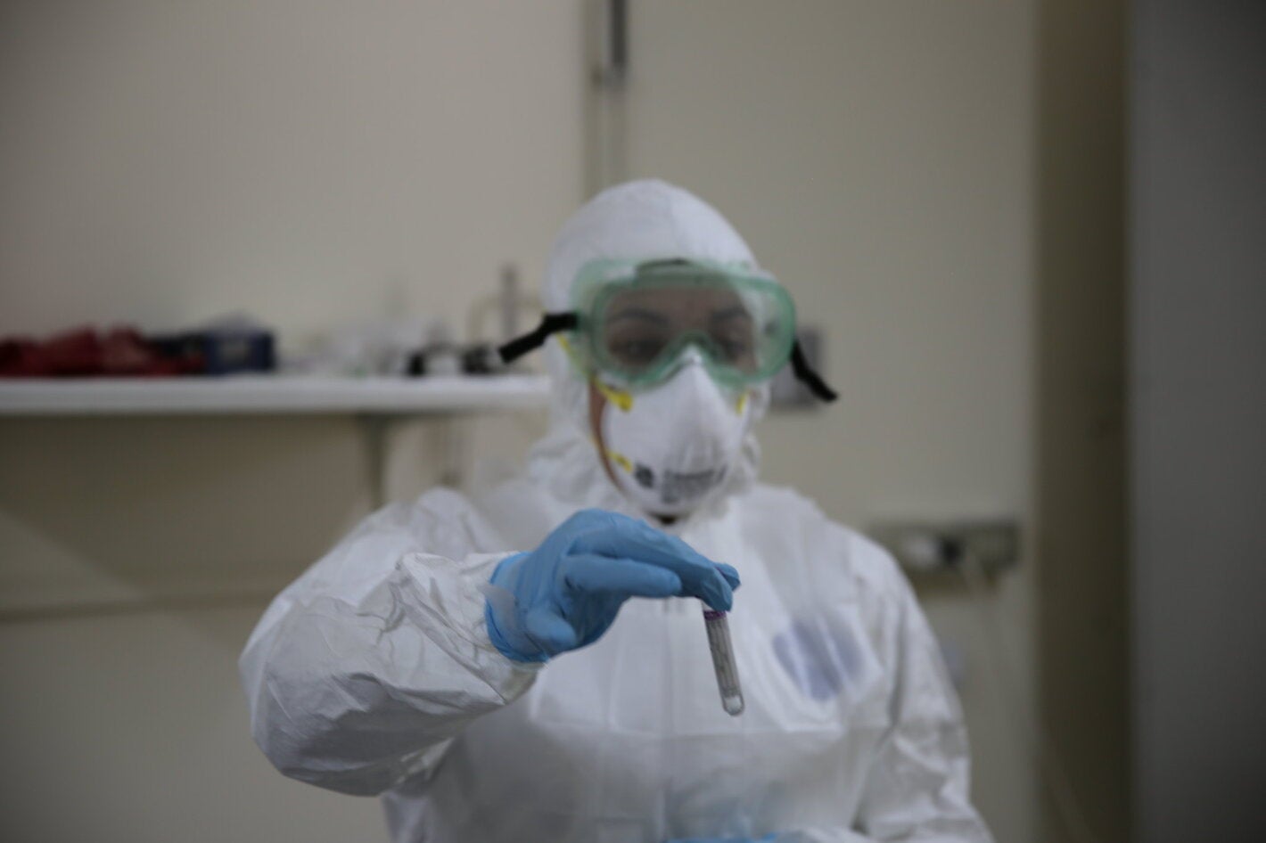 health workers in PPE using general diagnostic tests