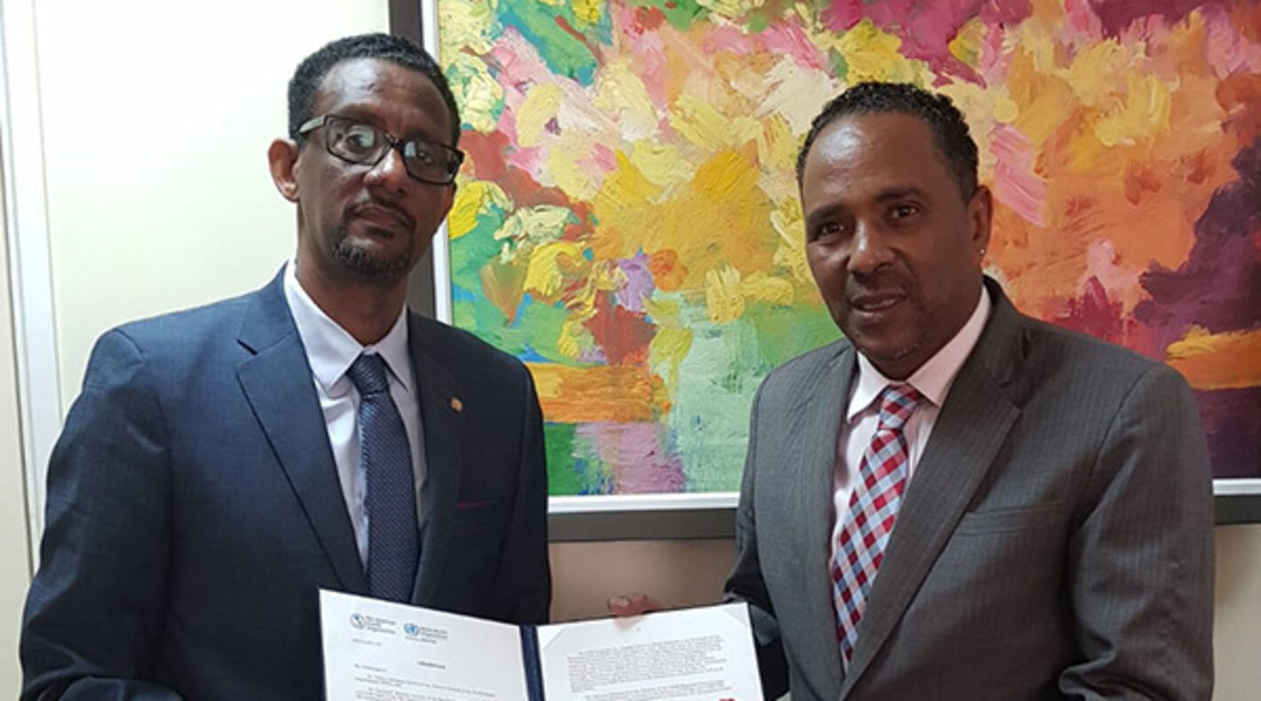 From left, Dr Yitades Gebre, PWR-ECC and Hon Dr Kenneth Darroux, Minister of Foreign Affairs