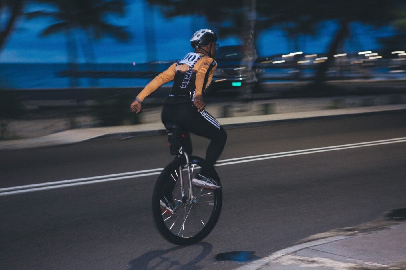 Unicyclist warming up at the Walk the Talk.