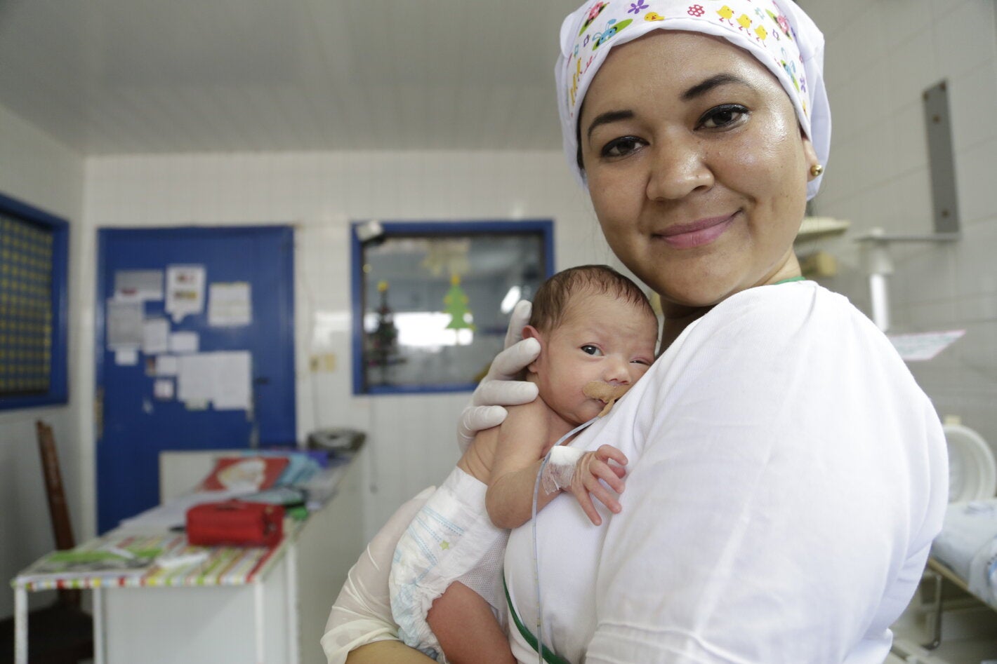 Nurse holding a newborn