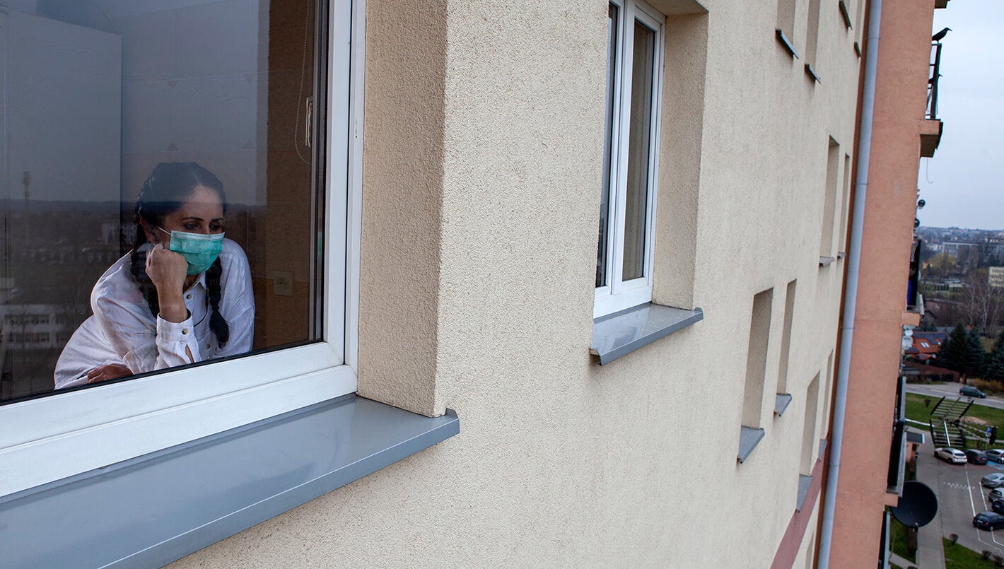 Woman looking out the window
