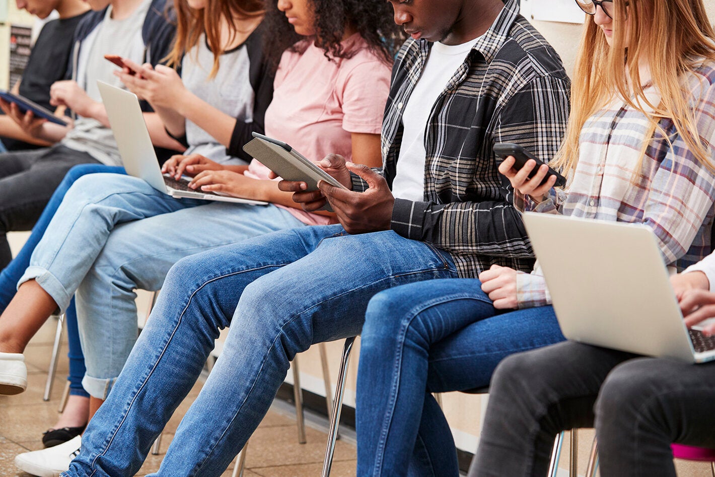 Young people on mobile devices