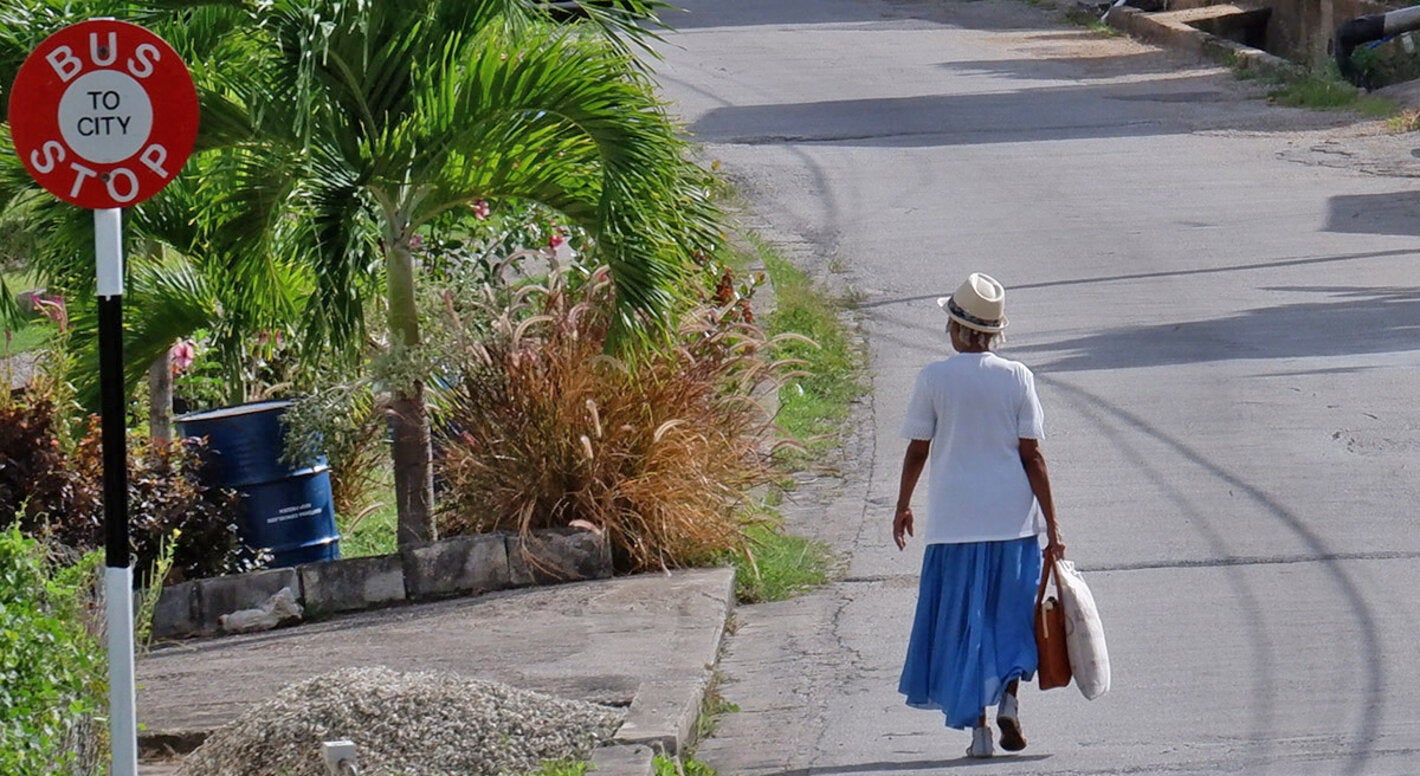 Elderly woman walking in Barbados