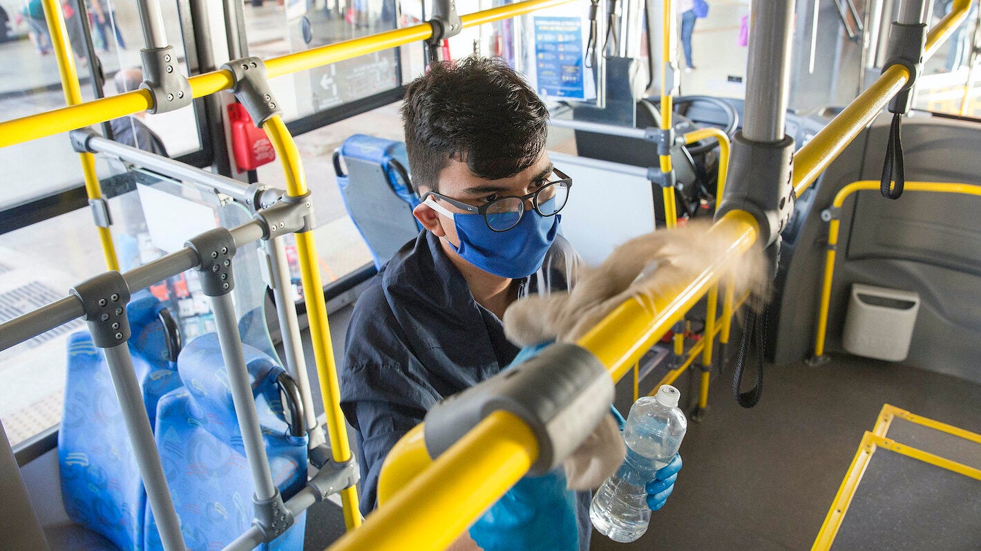 Young man riding the bus