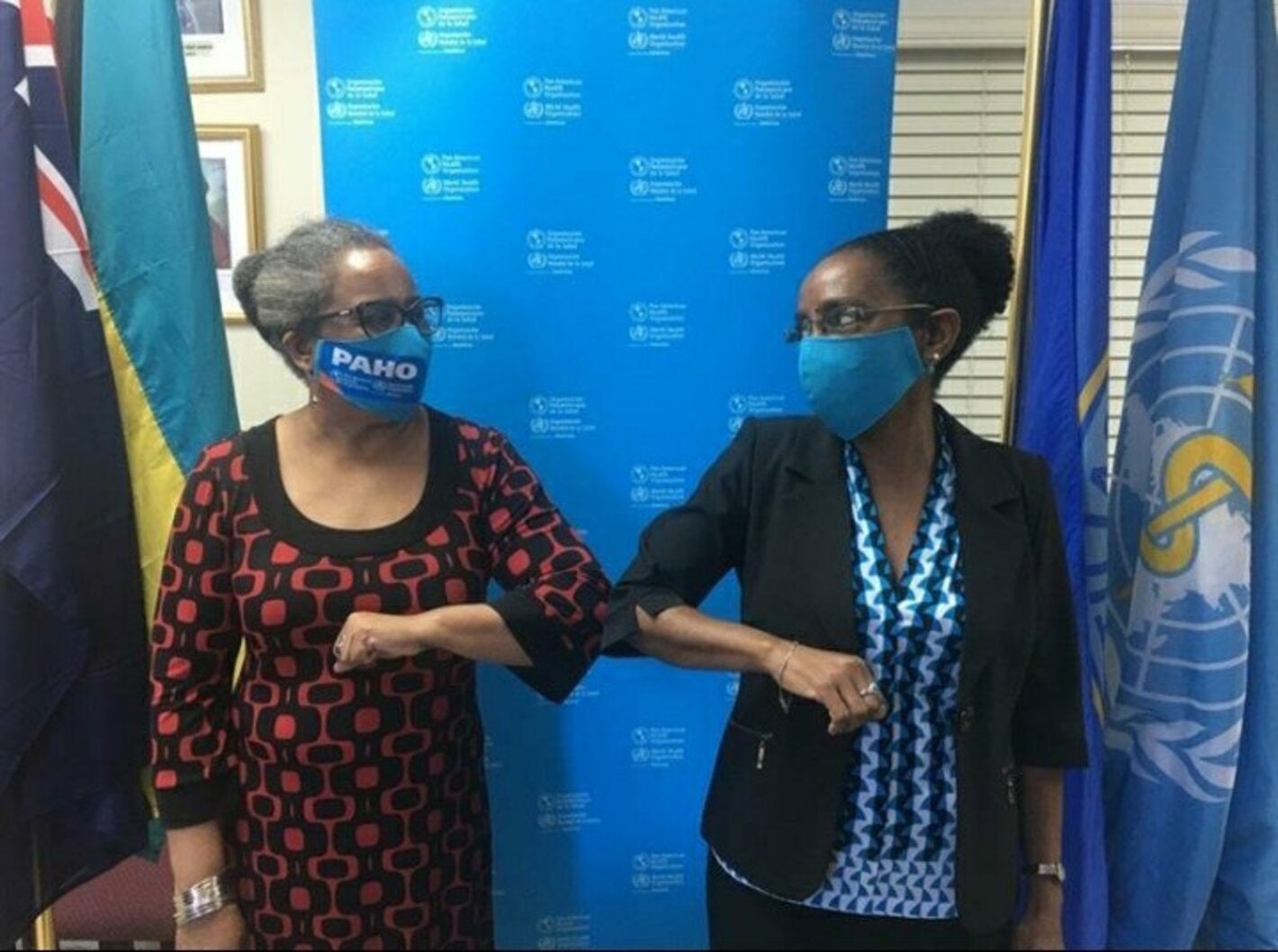 Dr Esther de Gourville, outgoing Country Representative and Dr. Eldonna Boisson, Incoming Country Representative during a friendly conversation.