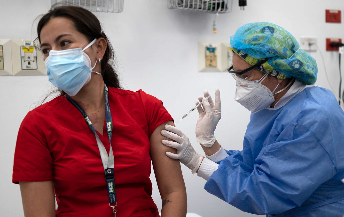 Health worker gets vaccinated 