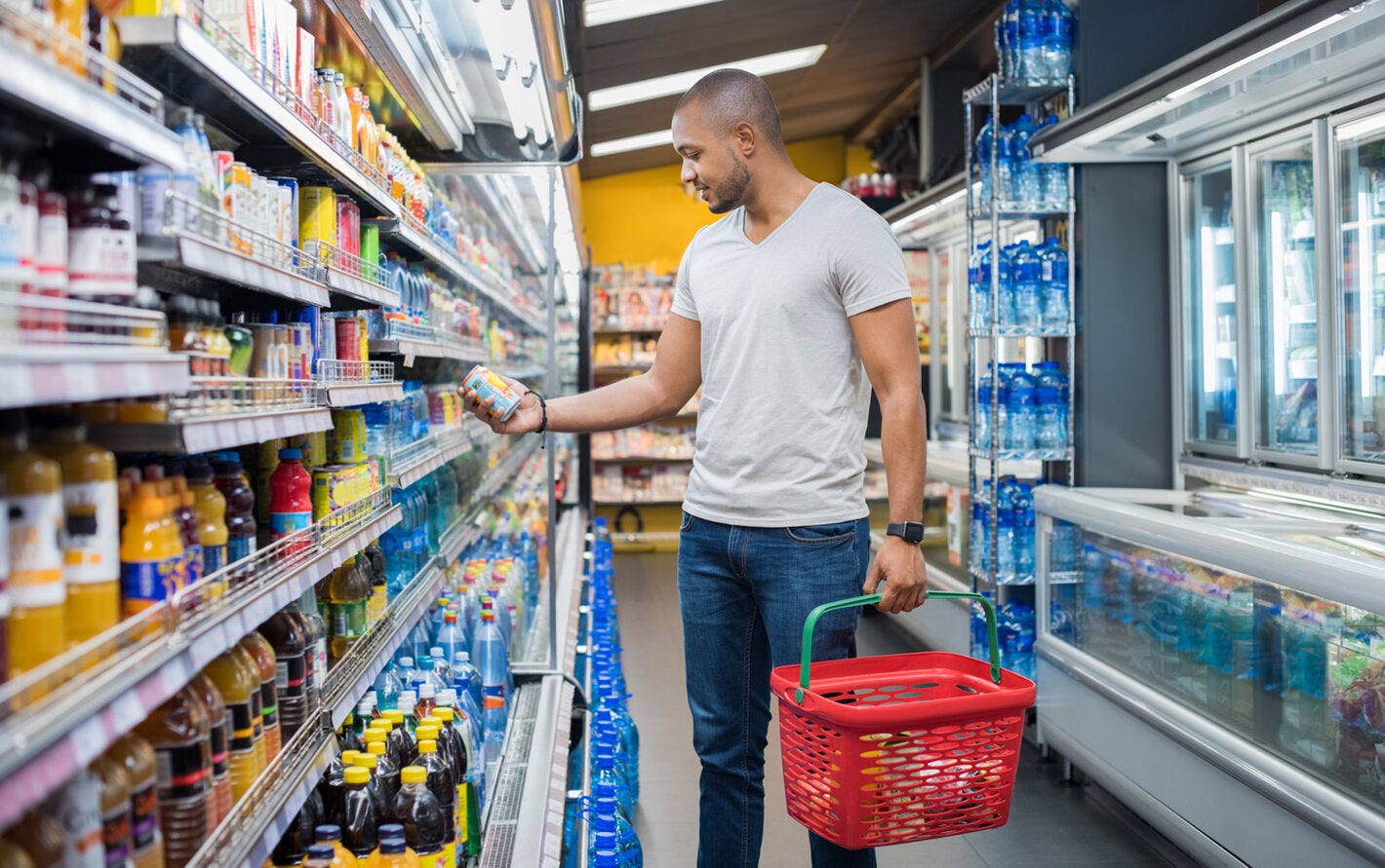 Man reads food labels