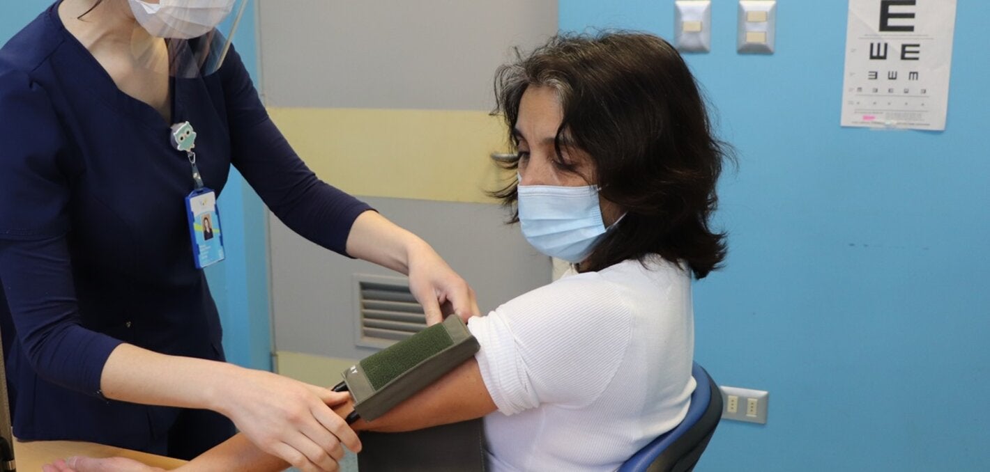 Measuring blood pressure of patient