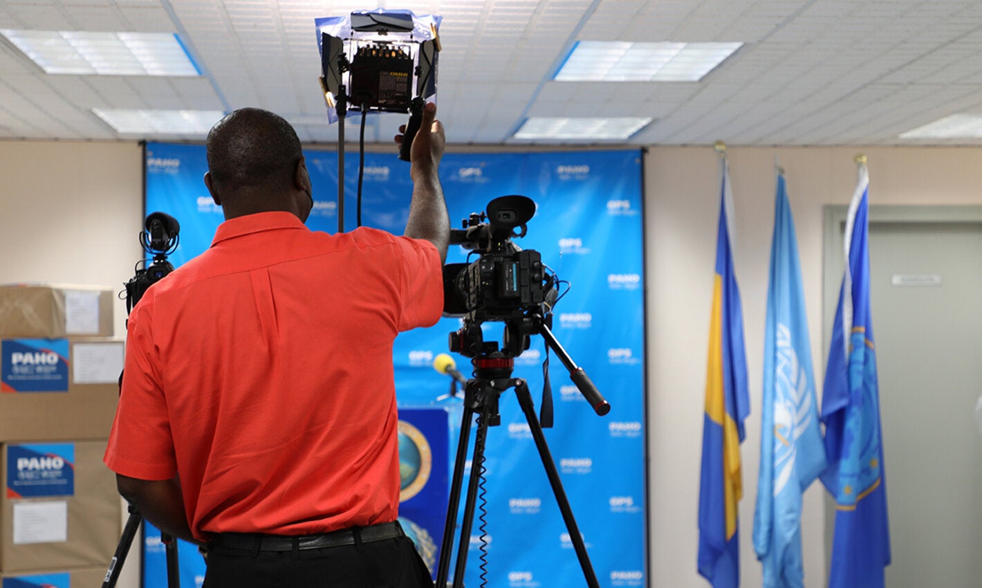 Videographer preparing for briefing