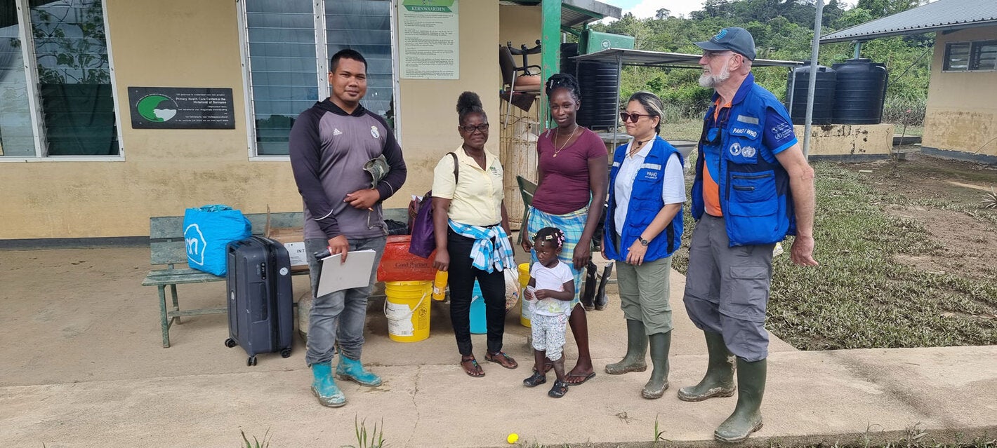 Groups photo with locals in Gakaba