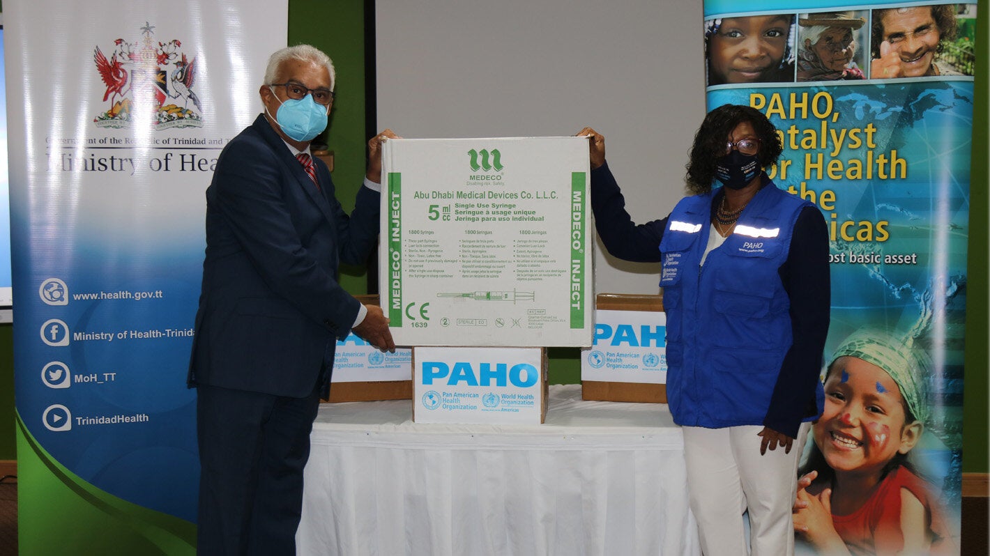 Minister of Health, The Honourable Terrence Deyalsingh and PAHO/WHO Representative, Dr Erica Wheeler 