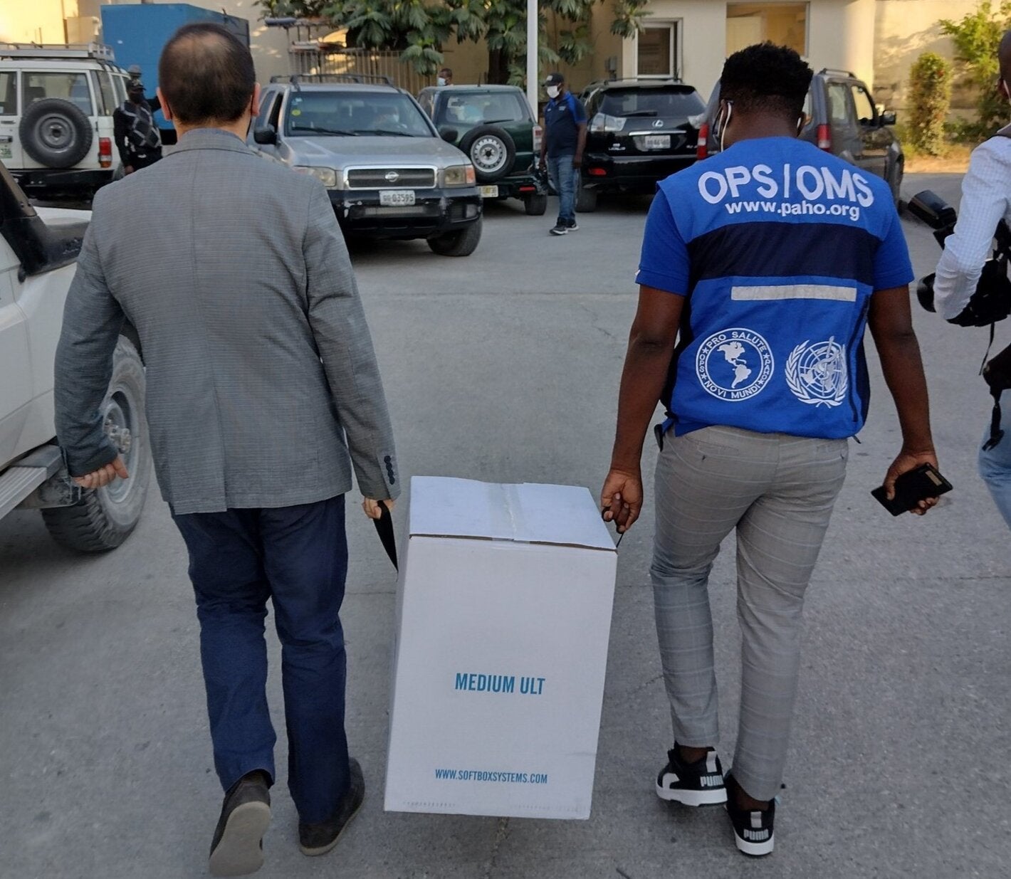man carries box with supplies