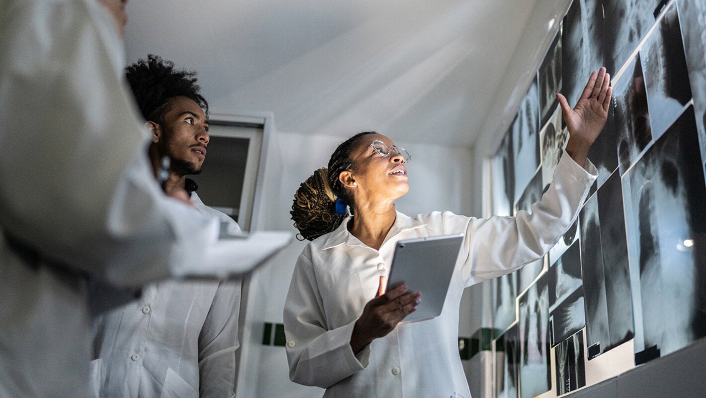 Doctors looking at xrays