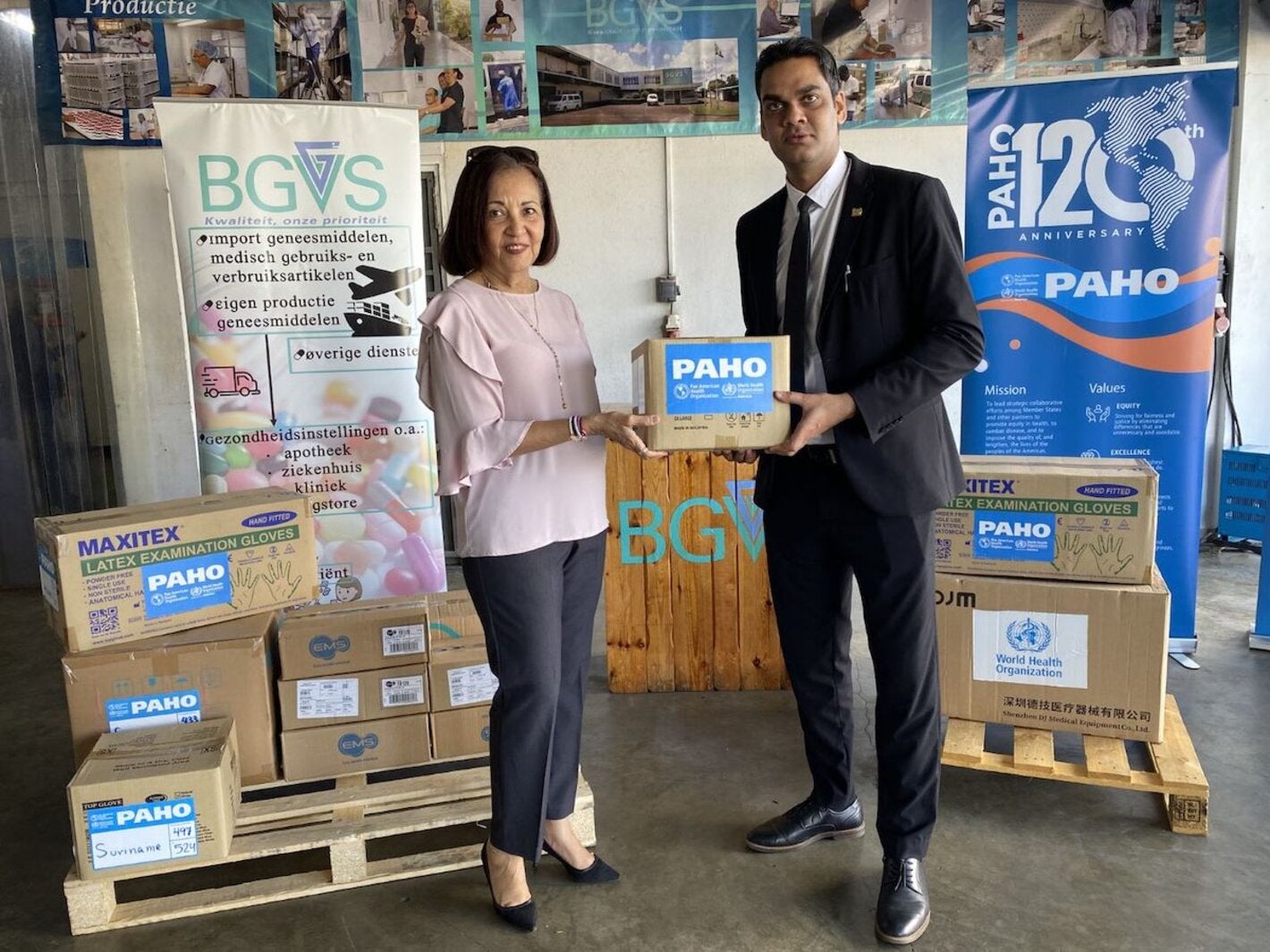 PAHO/WHO Representative Suriname Dr. Lilian Reneau-Vernon, and Minister of Health Dr. Amar Ramadhin during the handover of medical equipment and supplies 