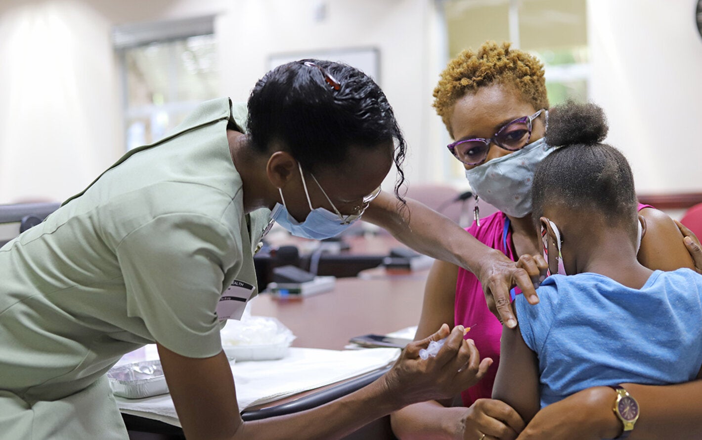 Child being vaccinated