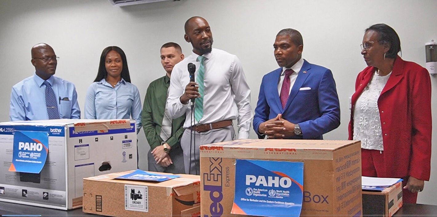 Officials at equipment donation