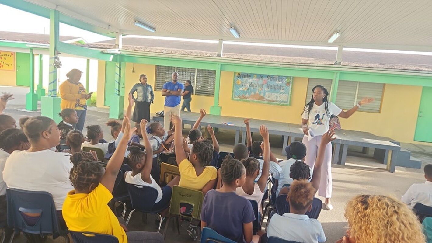 Students answering questions during World Obesity Day observance