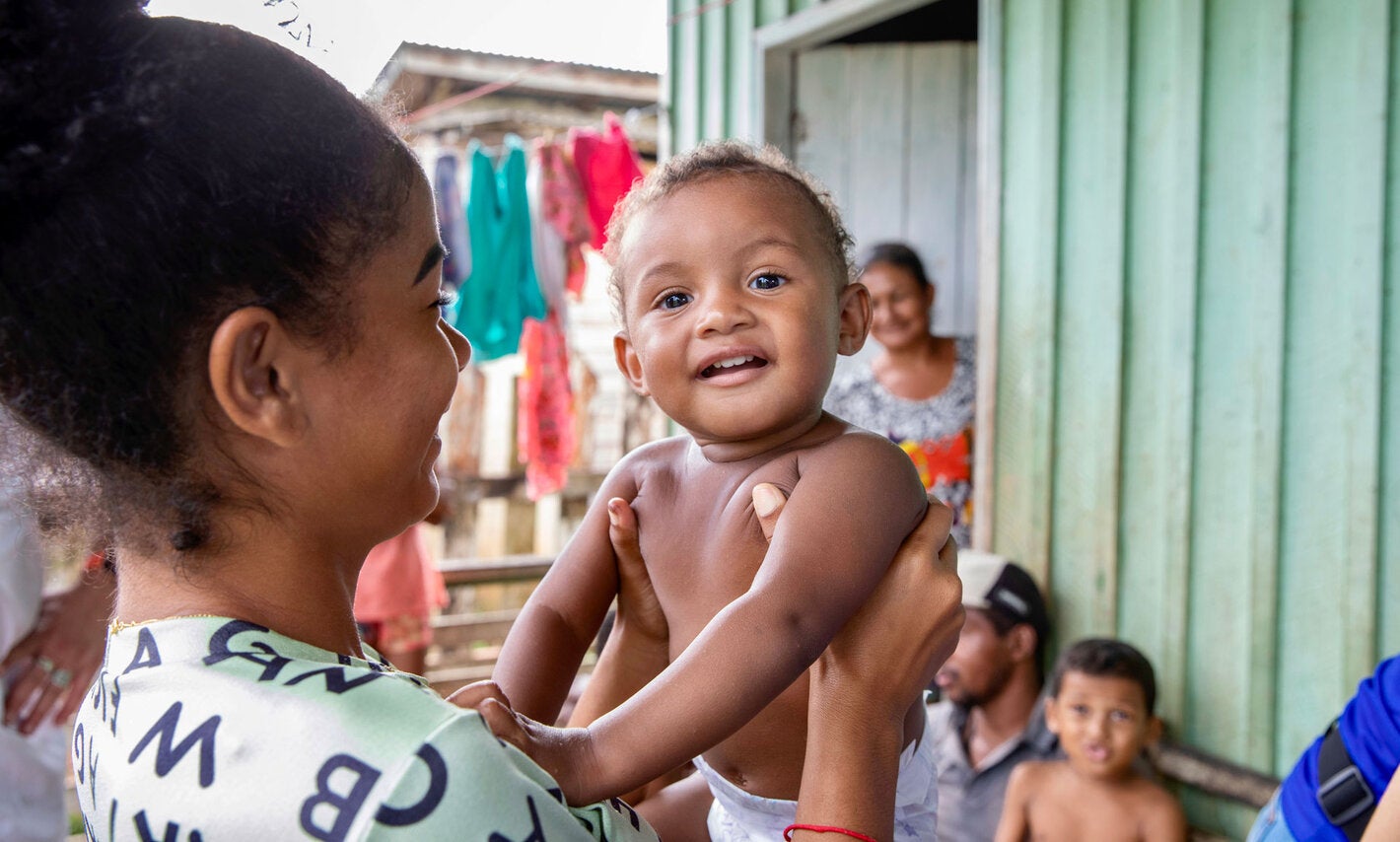 Mother and child smiling